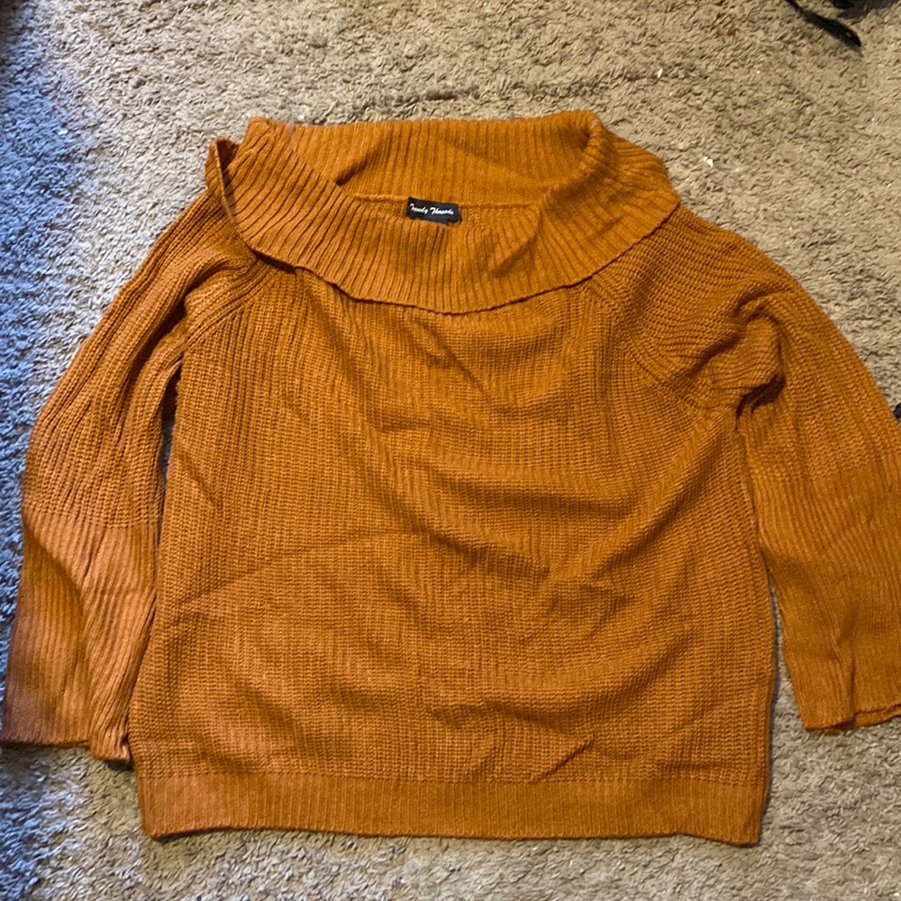 Sweater with a fly front. Size 2X and from rainbow